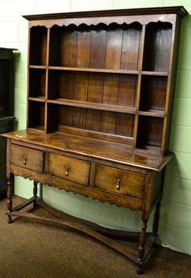 Lot 1345 - A 19th century oak dresser and rack, labelled ";Chapmans of Newcastle"