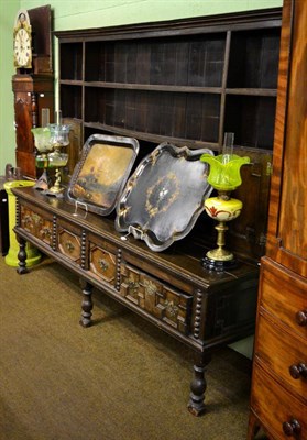 Lot 1350 - An 18th century Provincial oak dresser and rack