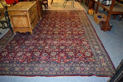 Lot 1357 - Tabriz Carpet, Iranian Azerbaijan, circa 1920, the abrashed raspberry field of Kuba design enclosed