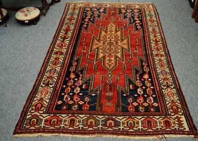 Lot 1359 - A Persian rug