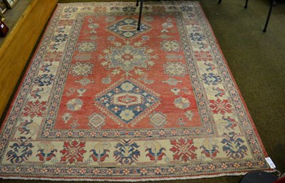 Lot 1367 - Caucasian design rug, North Afghanistan, the strawberry field with three central medallion...