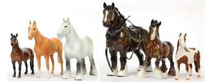 Lot 74 - Beswick Horses Comprising: Burnham Beauty, model No. 2309, brown gloss, harnessed; Pinto Pony,...