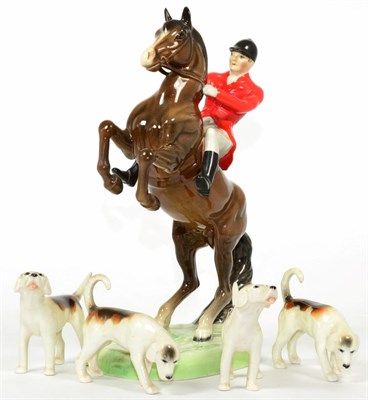 Lot 79 - Beswick Huntsman (On Rearing Horse), model No. 868, Second Version; together with four Fox...