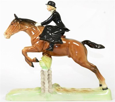 Lot 83 - Beswick Huntswoman, Style One - Rider and Horse Jumping, model No. 982, brown gloss