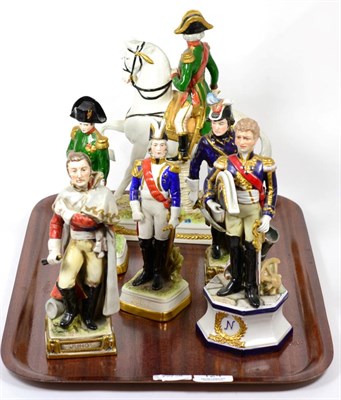 Lot 124 - A group of Continental porcelain military figures including Napoleon and Bessieres on...