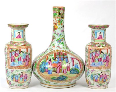 Lot 128 - A 19th century Chinese Canton porcelain bottle vase; and a further pair of rouleau shaped examples