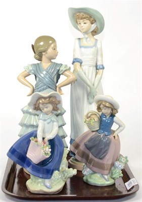 Lot 130 - Three Lladro figures and a Nao figure (4)