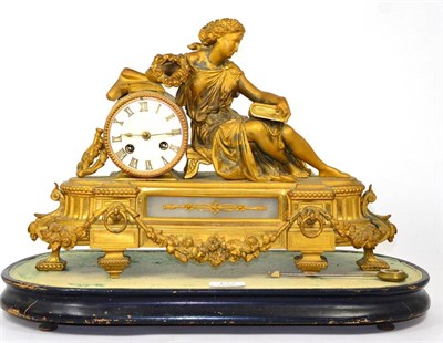 Lot 137 - A 19th century Continental gilt metal figural mantel clock, on ebonised plinth base