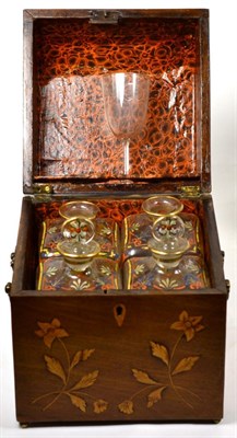 Lot 157 - A floral marquetry inlaid decanter box with later decorated bottles