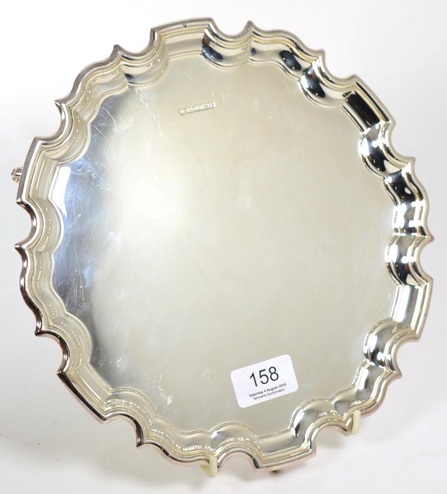 Lot 158 - A shaped circular silver salver, Carr's, Sheffield 2005, 25cm diameter, 17.9ozt