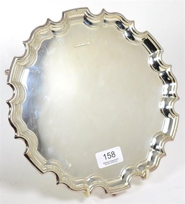 Lot 158 - A shaped circular silver salver, Carr's, Sheffield 2005, 25cm diameter, 17.9ozt