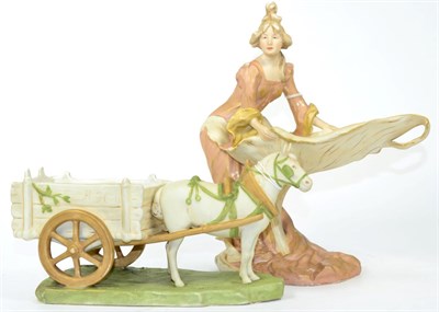Lot 170 - Royal Dux figure of a maiden on a lily pad, and another of a horse and cart (2)