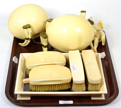 Lot 177 - An early 20th century ivory part dressing table set, circa 1920; a Japanese carved ivory...