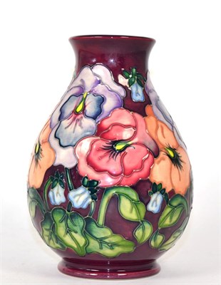 Lot 185 - A modern Moorcroft Pansy pattern vase, 19.5cm high