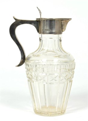 Lot 191 - A silver mounted small cut glass jug