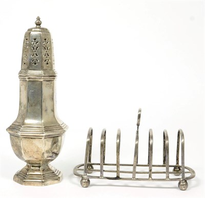 Lot 193 - A large silver octagonal caster, Birmingham 1965; and a silver toastrack Sheffield 1906, 12ozt (2)