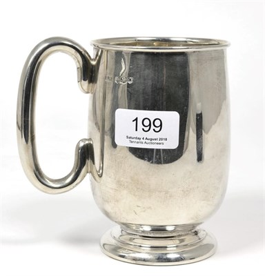 Lot 199 - A silver mug, Viners Ltd, Sheffield 1956, 13cm high, 11.1ozt