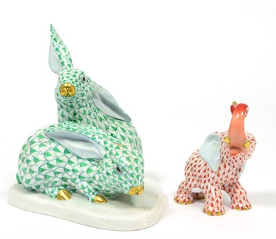 Lot 208 - A Herend porcelain group of rabbits; and a model of an elephant, the rabbits 13cm wide (2)