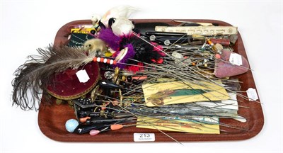 Lot 213 - Assorted decorative hat pins, sewing accessories etc