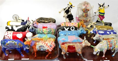 Lot 245 - A large group of cow parade porcelain and resin figures (two trays)