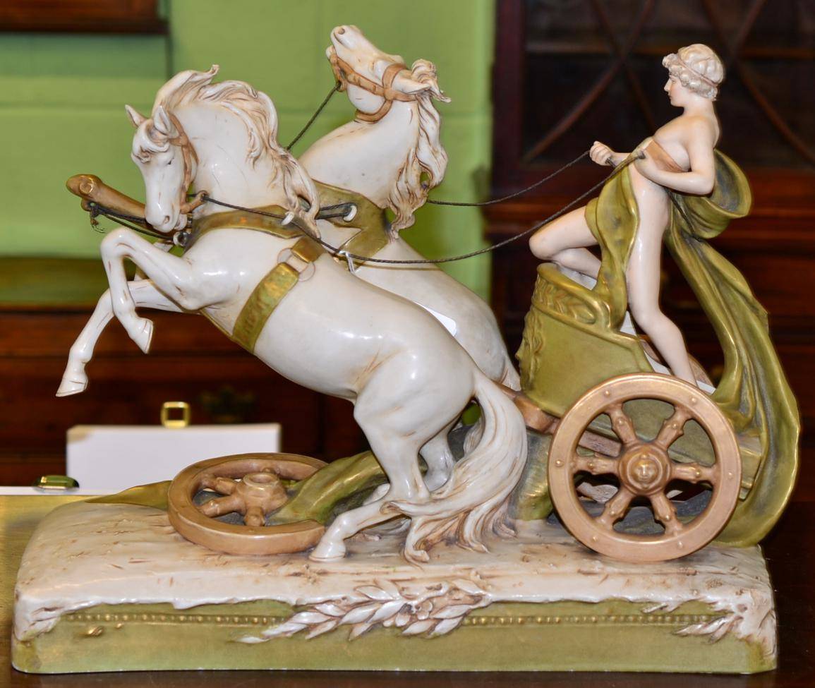 Lot 260 - Royal Dux style figure of a classical gent on a chariot with two horses