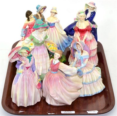 Lot 264 - Royal Doulton figures to include: Miss Demure; Gay Morning; Daydreams; Delphine and Top O' The Hill