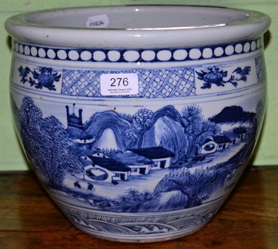 Lot 276 - A Chinese blue and white porcelain jardiniere, decorated with a continuous landscape