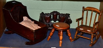 Lot 306 - Dolls country style rocking chair, stool, settle and a cradle (4)