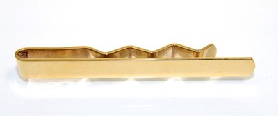 Lot 347 - A 9 carat gold tie slide, length 7cm