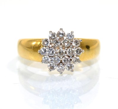 Lot 357 - A diamond cluster ring, a cluster of round brilliant cut diamonds in claw settings to a broad...