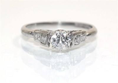 Lot 362 - An Art Deco solitaire diamond ring, an old cut diamond in a claw setting, to square cut diamond set