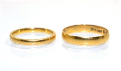 Lot 366 - Two 22 carat gold band rings, finger size N1/2 and L (2)