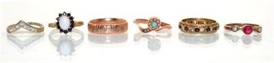 Lot 368 - A 9 carat rose gold cabochon garnet and seed pearl three stone ring, finger size M; a 9 carat...