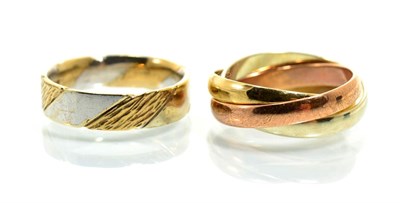 Lot 369 - A 9 carat gold Russian band ring, finger size M and a 9 carat two colour gold band ring, finger...