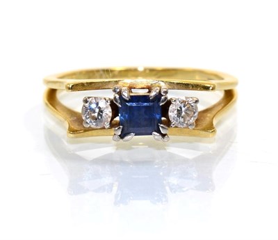 Lot 373 - A sapphire and diamond three stone ring, a square cut sapphire spaced by round brilliant cut...