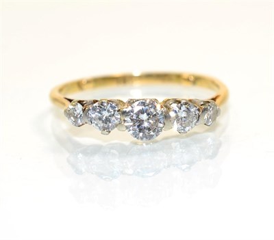 Lot 375 - A diamond five stone ring, graduated round brilliant cut diamonds, in claw settings, total...