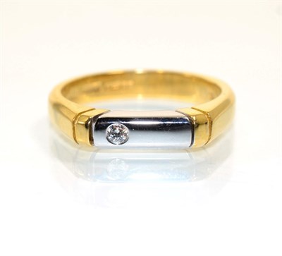 Lot 376 - An 18 carat two colour gold diamond ring, a round brilliant cut diamond inset to a white gold...