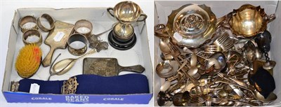 Lot 383 - A small group of assorted silver items including napkin rings; miniature hand mirrors; trophy...