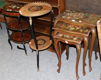 Lot 1050 - A nest of three floral painted occasional tables; together with a marquetry inlaid gilt metal...