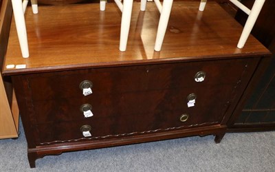 Lot 1064 - A low mahogany three height chest of drawers