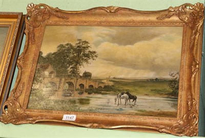 Lot 1147 - Thomas J Purchas (1855-1930) Horses watering and a cart on a river crossing, oil on board,...