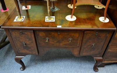 Lot 1195 - A walnut and mahogany side table/low boy on cabriole supports