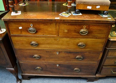 Lot 1196 - An early 19th century mahogany four height chest of drawers, on bracket feet