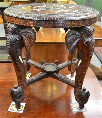 Lot 1210 - Indian table with elephant carved supports, circa 1930