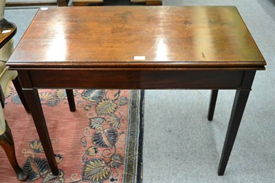 Lot 1217 - A 19th century mahogany fold over card table