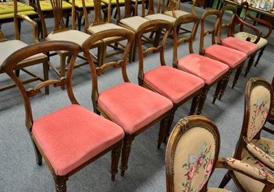 Lot 1228 - A set of six early Victorian rosewood dining chairs and a mahogany carver of similar style (7)