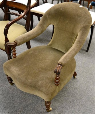 Lot 1231 - A Victorian upholstered open armchair on spiral turned supports