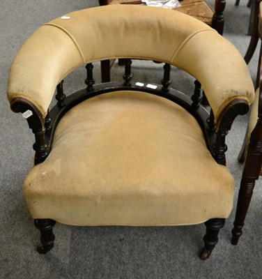 Lot 1233 - A Victorian horse shoe shaped upholstered armchair