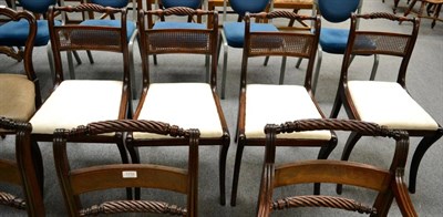 Lot 1235 - A set of four Regency mahogany dining chairs with rope twist crest rail and cane work back