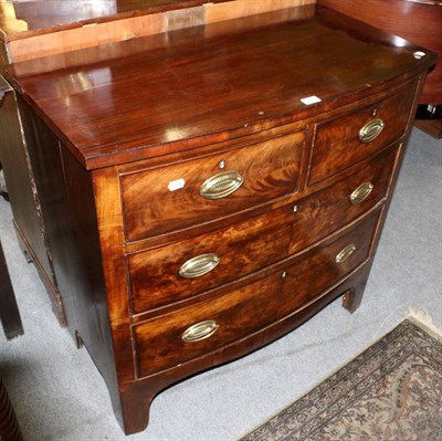 Lot 1253 - George III mahogany bow fronted three height chest of drawers